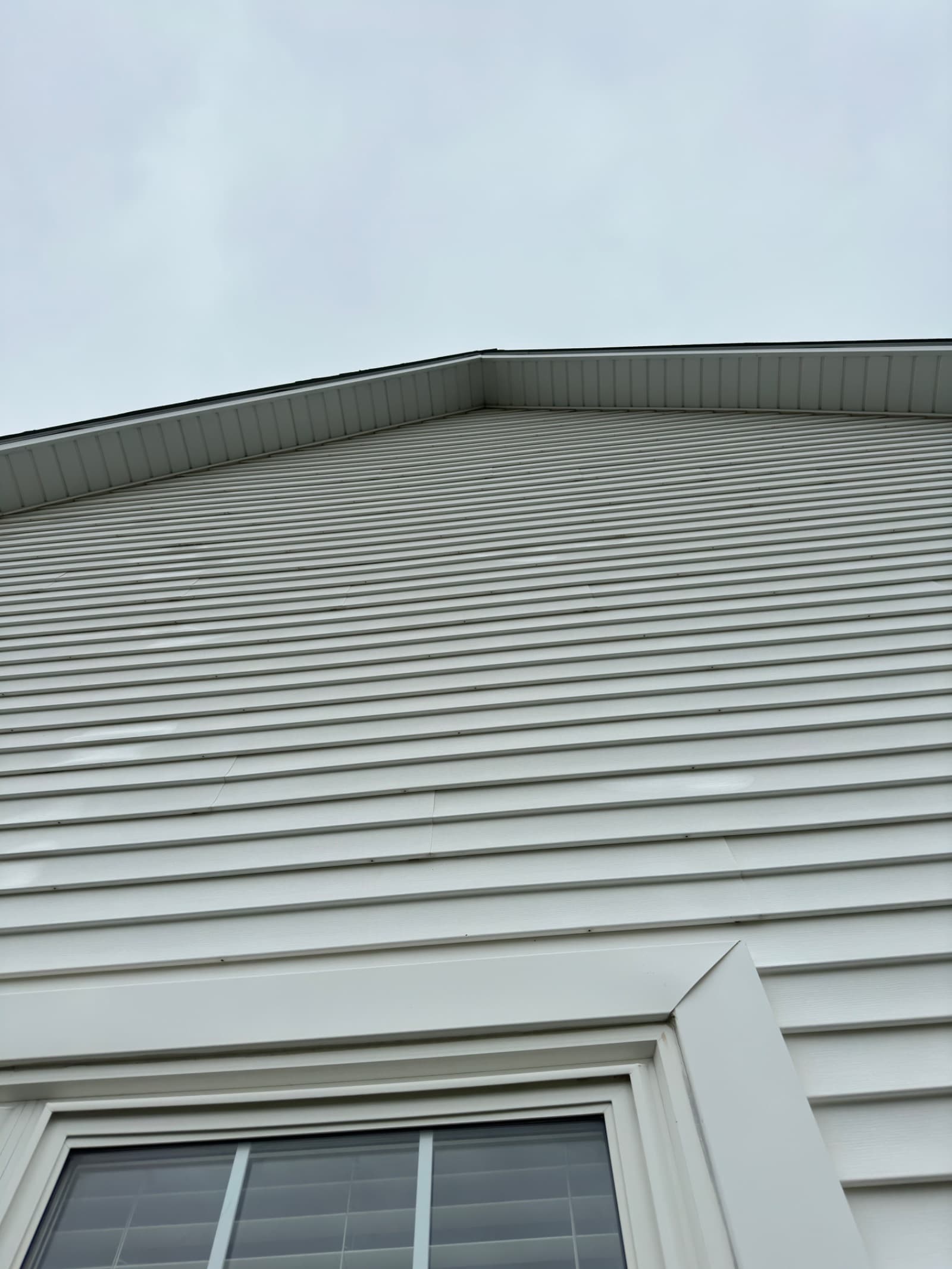 Clean white vinyl siding on house in Crown Point, Indiana