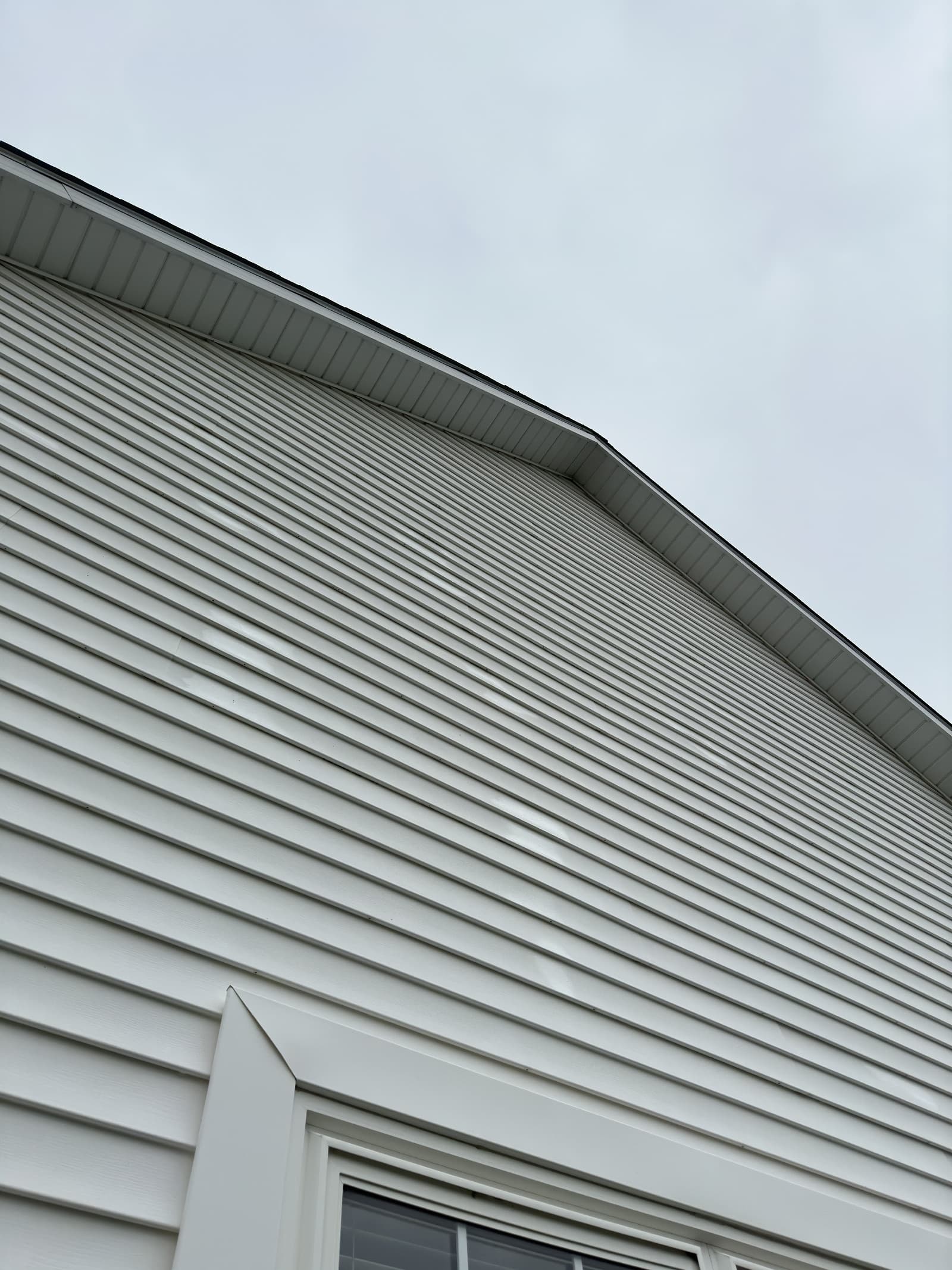 Clean white vinyl siding on house in Crown Point, Indiana