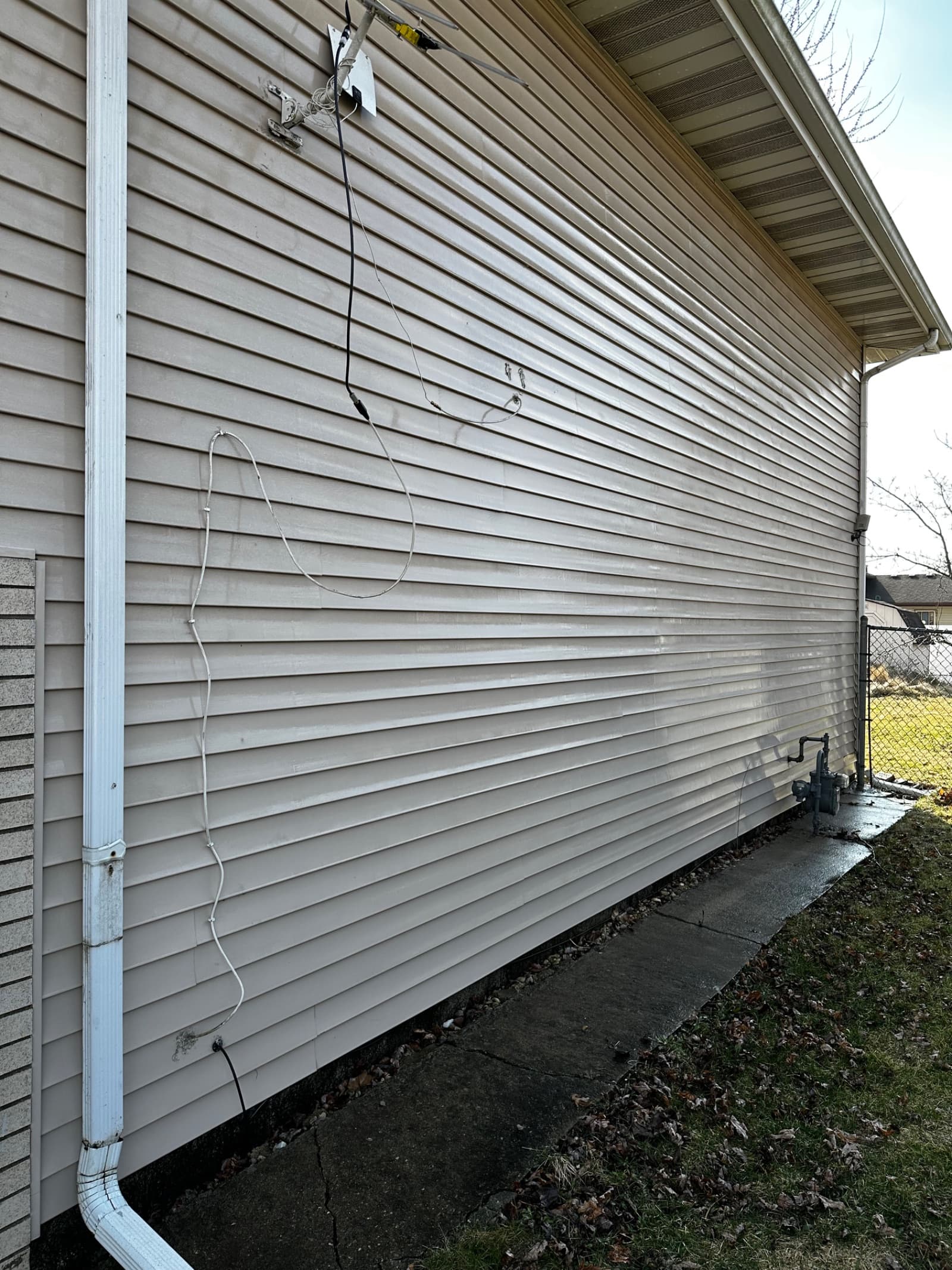 Clean vinyl siding on house after washing in Demotte, Indiana