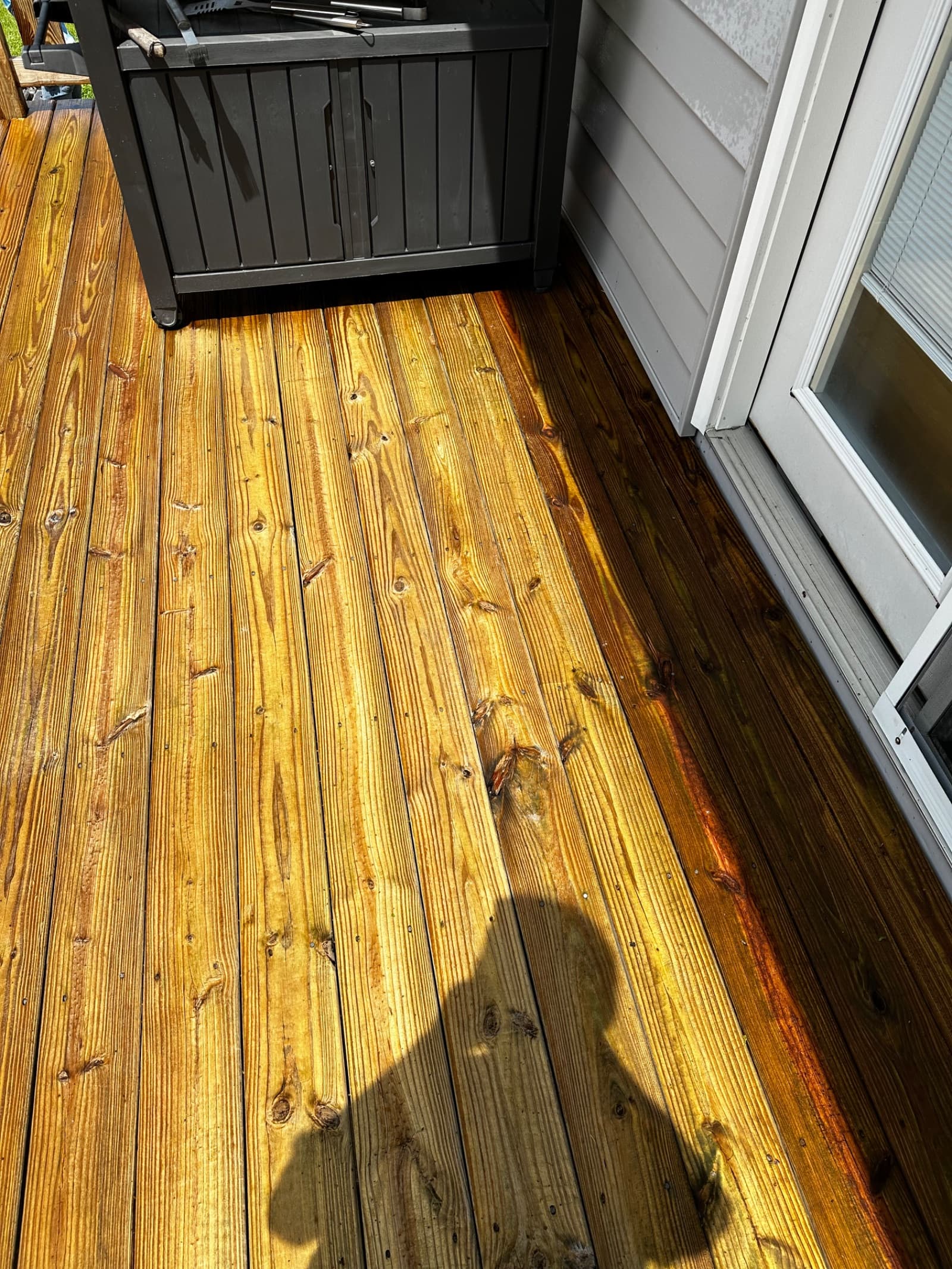 Clean wooden deck with visible grain and no stains