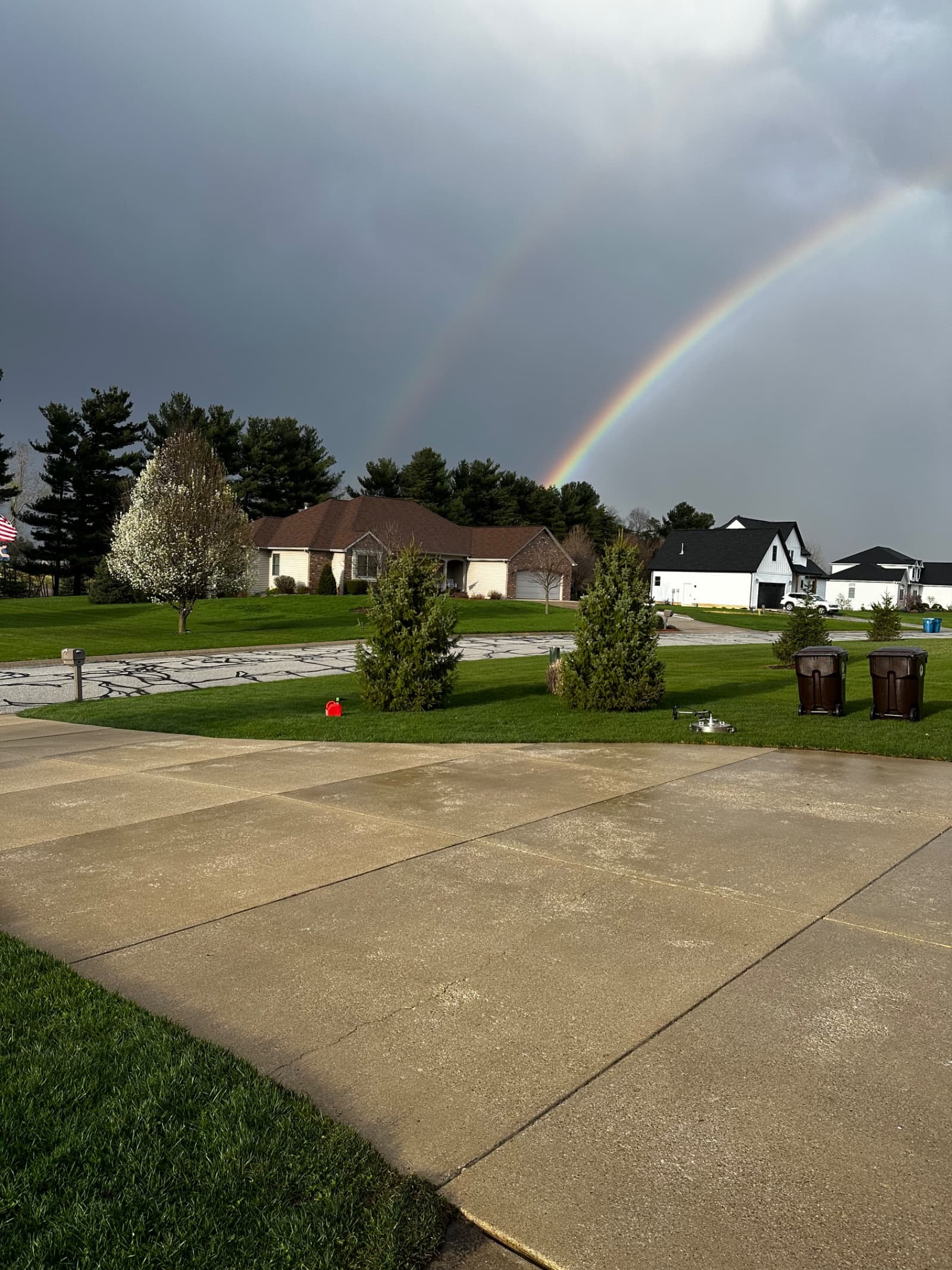 Clean concrete driveway with rainbow in Crown Point, Indiana
